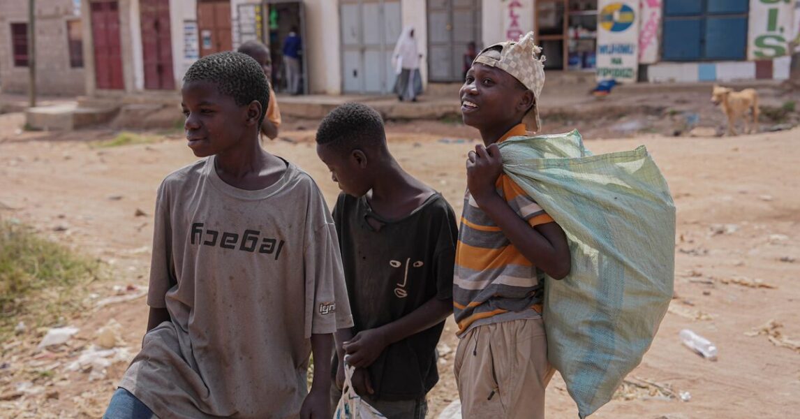 Three boys on the streets in Tanzania