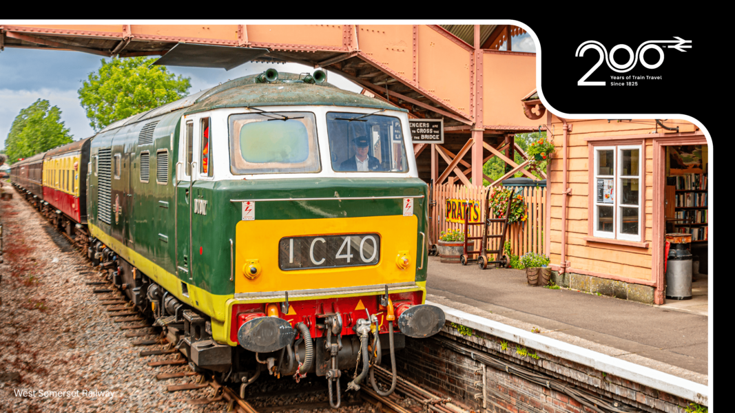 Green and yellow train celebrating Railway200 campaign