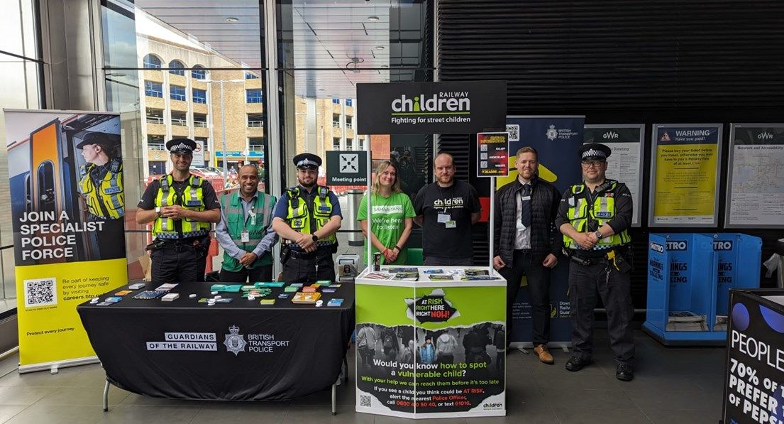 Image of Railway staff and BTP in a station raising awareness